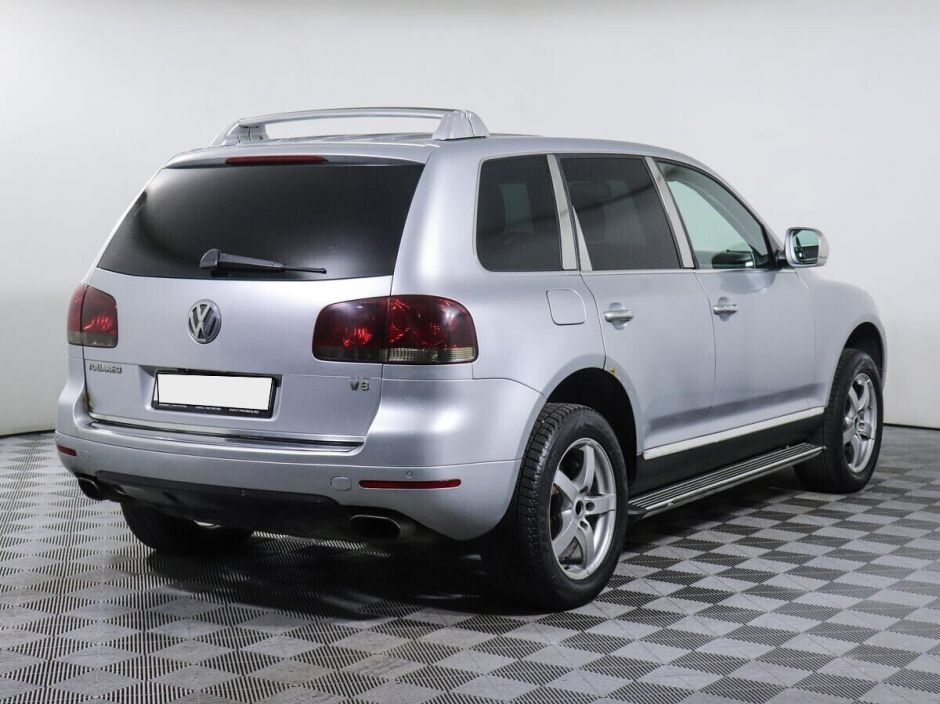 Фольксваген туарег пробегом москва. Volkswagen Touareg 4.2 (310 л.с.). Volkswagen Touareg 2010 — 2014 II серебристый. Фольксваген 310 сил. Фольксваген 310 сил в стоке