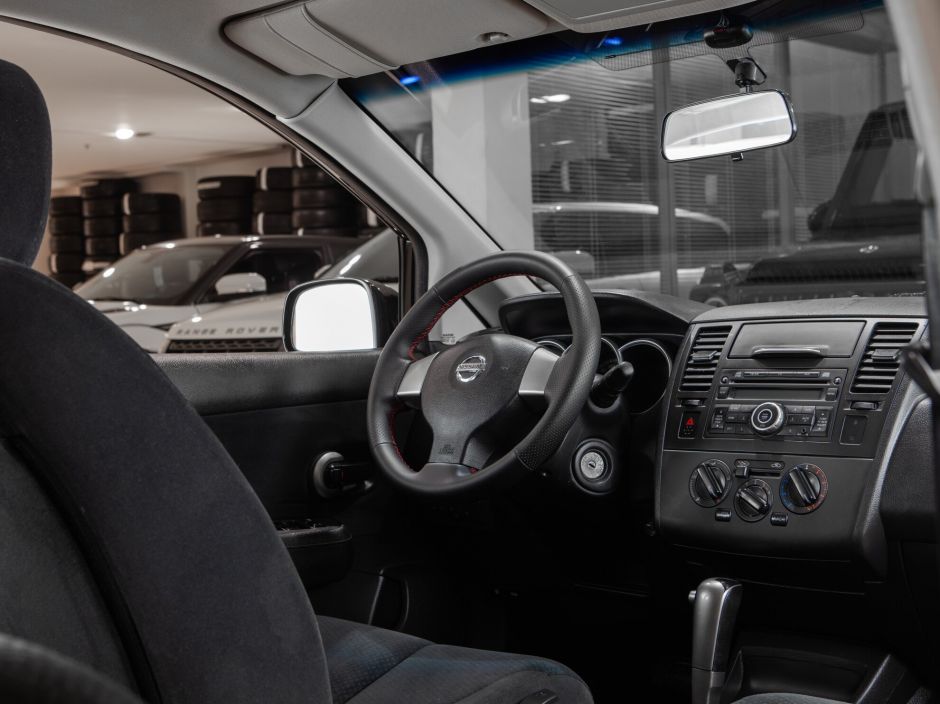 Nissan Tiida 0.0 АКПП, 2010, 130 285 км фото 5